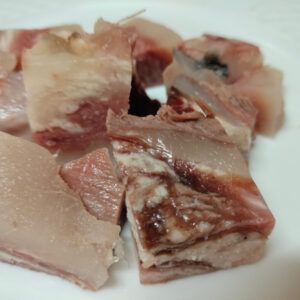 Cap i pota de vedella tallada